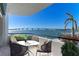 Relaxing balcony offering scenic water and bridge views at 306 Golden Gate Pt # 2, Sarasota, FL 34236