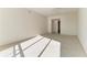 Bright bedroom with hardwood floors and natural light at 306 Golden Gate Pt # 2, Sarasota, FL 34236