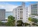 Upscale building exterior with water view at 306 Golden Gate Pt # 2, Sarasota, FL 34236