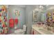 Clean bathroom with updated vanity and a floral design at 4228 Central Sarasota Pkwy # 1013, Sarasota, FL 34238