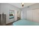 Spacious bedroom with mirrored closet doors and ensuite bathroom access at 4228 Central Sarasota Pkwy # 1013, Sarasota, FL 34238