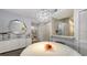 Bright dining area with modern light fixture at 4228 Central Sarasota Pkwy # 1013, Sarasota, FL 34238