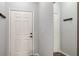 Bright condo entry with coat rack and mirror at 4228 Central Sarasota Pkwy # 1013, Sarasota, FL 34238