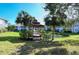 Community gazebo overlooking a pond and lush landscaping at 4228 Central Sarasota Pkwy # 1013, Sarasota, FL 34238