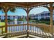 Relaxing gazebo with pond and community building views at 4228 Central Sarasota Pkwy # 1013, Sarasota, FL 34238