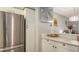 Modern kitchen with stainless steel appliances and white cabinetry at 4228 Central Sarasota Pkwy # 1013, Sarasota, FL 34238