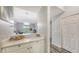 Bright kitchen area with a breakfast bar and white cabinets at 4228 Central Sarasota Pkwy # 1013, Sarasota, FL 34238