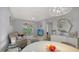 Living room with access to patio and bedroom at 4228 Central Sarasota Pkwy # 1013, Sarasota, FL 34238