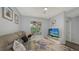 Comfortable living room with patio access at 4228 Central Sarasota Pkwy # 1013, Sarasota, FL 34238