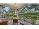 Peaceful screened patio with outdoor furniture, offering a private retreat at 4228 Central Sarasota Pkwy # 1013, Sarasota, FL 34238