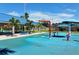 Sprayground with water features and shaded seating at 4228 Central Sarasota Pkwy # 1013, Sarasota, FL 34238