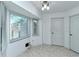 Bright dining area with large windows and tile floor at 4284 Watova Ave, North Port, FL 34286