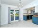 Bright kitchen with butcher block countertops and stainless steel appliances at 4284 Watova Ave, North Port, FL 34286