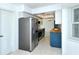 Stainless steel refrigerator in updated kitchen at 4284 Watova Ave, North Port, FL 34286