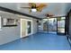 Spacious screened porch with ceiling fans and backyard views at 4284 Watova Ave, North Port, FL 34286