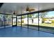 Screened porch with backyard views and ceiling fans at 4284 Watova Ave, North Port, FL 34286