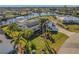 Single-story home with solar panels, pool, and canal views at 4430 Wynkoop Cir, Port Charlotte, FL 33948