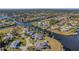 Aerial perspective showing the home's desirable waterfront setting at 4430 Wynkoop Cir, Port Charlotte, FL 33948