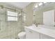 Updated bathroom with a large walk-in shower and modern vanity at 4430 Wynkoop Cir, Port Charlotte, FL 33948