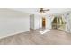 Spacious bedroom featuring light walls and wood-look flooring at 4430 Wynkoop Cir, Port Charlotte, FL 33948