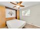 Bedroom with wall mounted bed and ceiling fan at 4430 Wynkoop Cir, Port Charlotte, FL 33948