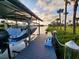Convenient boat dock with lift and shaded seating area at 4430 Wynkoop Cir, Port Charlotte, FL 33948