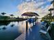 Private boat lift and dock with covered storage; perfect for boat owners at 4430 Wynkoop Cir, Port Charlotte, FL 33948