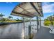 Private boat dock with covered lift and waterfront views at 4430 Wynkoop Cir, Port Charlotte, FL 33948