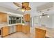 Spacious kitchen with light wood cabinets and granite countertops at 4430 Wynkoop Cir, Port Charlotte, FL 33948