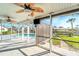 Screened lanai overlooking the pool and backyard at 4430 Wynkoop Cir, Port Charlotte, FL 33948