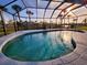 Relaxing screened pool with water view at 4430 Wynkoop Cir, Port Charlotte, FL 33948
