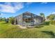 Screened pool enclosure providing shade and privacy at 4430 Wynkoop Cir, Port Charlotte, FL 33948