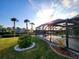 Screened pool with canal view, lush yard at 4430 Wynkoop Cir, Port Charlotte, FL 33948