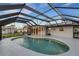 Enclosed pool and patio area, perfect for outdoor entertaining at 4430 Wynkoop Cir, Port Charlotte, FL 33948