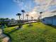 Picturesque canal view with palm trees at 4430 Wynkoop Cir, Port Charlotte, FL 33948