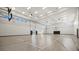 Indoor basketball court with hardwood flooring and seating at 4886 Seafoam Trl, Bradenton, FL 34211