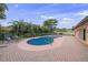 Inviting pool and spa area with patio furniture at 523 N Spoonbill Dr, Sarasota, FL 34236