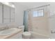 Clean bathroom with tub, shower, and vanity at 5889 Canal Dr # I4, Bradenton, FL 34207