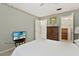 Bedroom with a double bed, dresser, and access to the bathroom and closet at 5889 Canal Dr # I4, Bradenton, FL 34207
