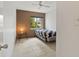 Small bedroom with twin bed and window at 5889 Canal Dr # I4, Bradenton, FL 34207