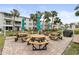 Community picnic area with tables and grills at 5889 Canal Dr # I4, Bradenton, FL 34207