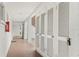 Hallway with access to storage and fire safety equipment at 5889 Canal Dr # I4, Bradenton, FL 34207