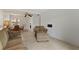 Living room with sofa, loveseat and access to dining area at 5889 Canal Dr # I4, Bradenton, FL 34207