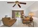 Living room with comfy seating and access to patio at 5889 Canal Dr # I4, Bradenton, FL 34207