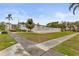 Community pool area with surrounding landscaping at 5889 Canal Dr # I4, Bradenton, FL 34207