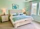 Spacious bedroom with a king-size bed and calming decor at 6014 Fiore Dr, Bradenton, FL 34208