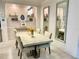 Elegant dining room with a large table and built-in shelving at 6014 Fiore Dr, Bradenton, FL 34208
