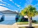 Two-car garage home with attractive landscaping at 6014 Fiore Dr, Bradenton, FL 34208