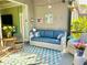 Cozy screened porch featuring comfortable seating and a view at 6014 Fiore Dr, Bradenton, FL 34208