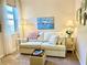 Cozy sitting area with a comfortable sofa and soft color palette at 6014 Fiore Dr, Bradenton, FL 34208